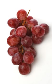 Cluster of grapes with drops over a white background. Look at my gallery for more fruits and vegetables