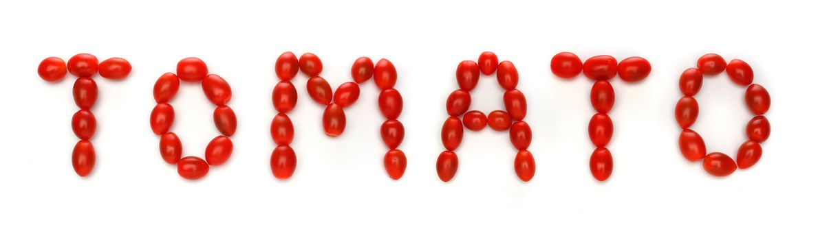 Word TOMATO written with cherry tomatoes. Look at my gallery for more fresh fruits and vegetables.