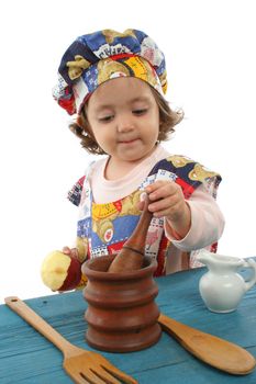 Cute toddler cooking dressed at a cheff. More pictures of this baby at my gallery
