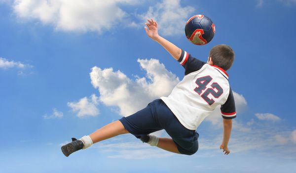 Sports. Boy playing soccer (ball on air). From my football series