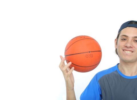 Young man playing basketball isolated. Funny expression From my sport series.