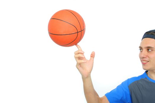 Young man playing basketball isolated. Funny expression From my sport series.