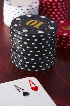 Texas hold em poker hand with casino chips