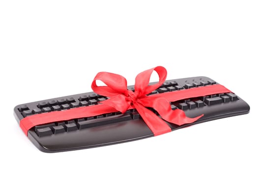 christmas gift - keyboard with red ribbon