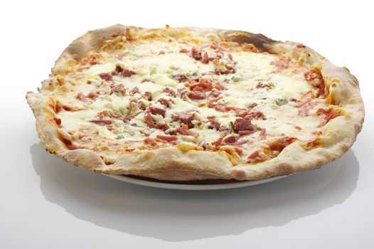 Pizza (filled with ham and blue cheese) on the plate over white background