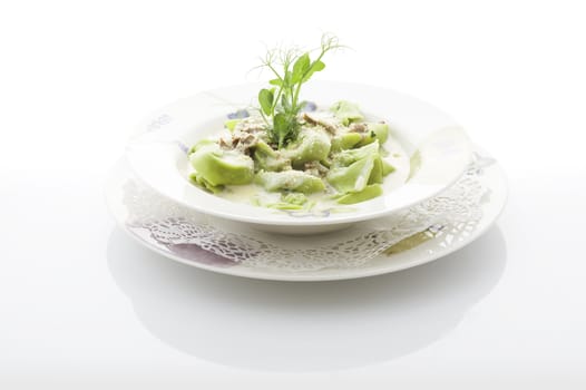 Mushroom pasta on the plate over white background