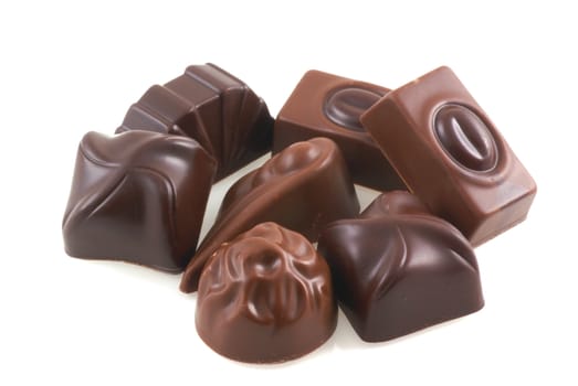 Sweet belgian chocolates isolated on a white background.             