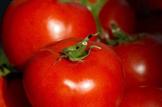 fresh ripe tomatoes macro closeup, selective focus