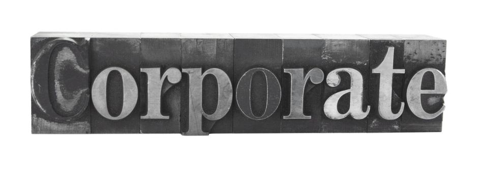 old metal letterpress letters form the word 'Corporate' isolated on white