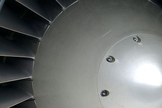 The center hub of a turbofan (jet) engine, a powerful symbol of industry, technology and progress