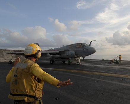 An EA-6B Prowler readies to launch from an aircraft carrier