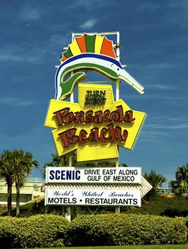 The iconic Pensacola Beach Sign in the shape of a fish is an example of classic americana landmarks