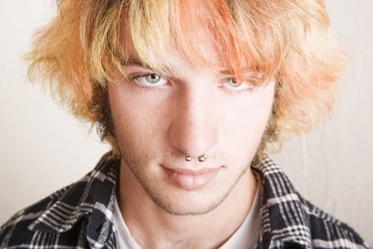 Close-Up of a Punk Boy with Brightly Colored Hair