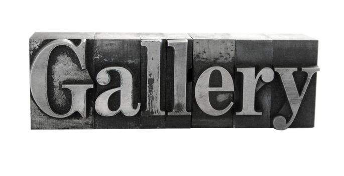 old metal letterpress letters form the word 'Gallery' isolated on white