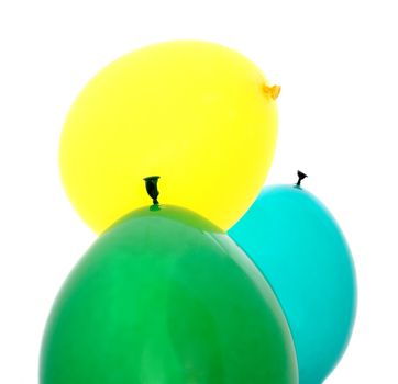 yellow, green and blue balloons isolated on white