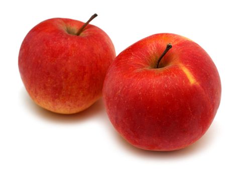 two red bright apples isoalted on white