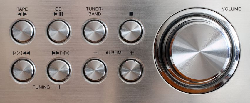 metallic volume handle and round control buttons