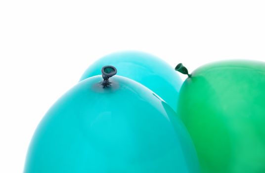 blue and green balloons isolated on white