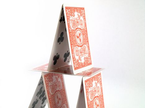 Balanced House of Cards on White Background