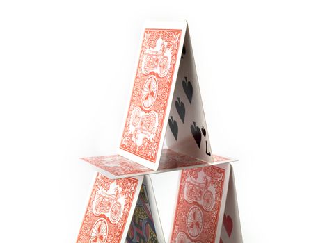 Balanced House of Cards on White Background