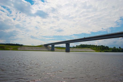 photo of the bridge through beautiful river