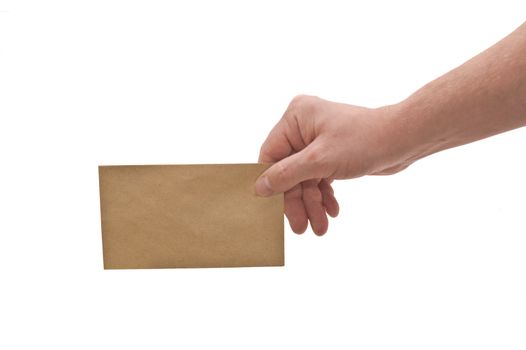 an isolated over white, caucasian man's hand holding a small brown mottled envelope 