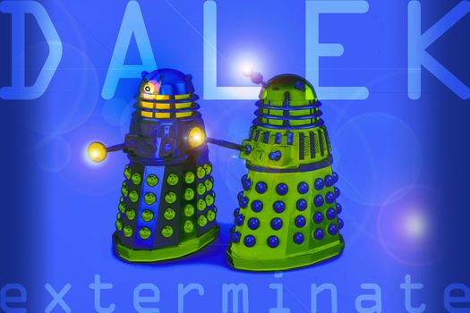 Two daleks set on a blue background with text spelling out the words dalek and exterminate.