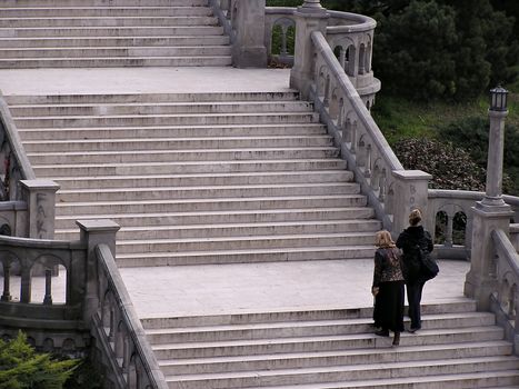 Stairway at Belgrade park named Kalemegdan with two women going upstairs.