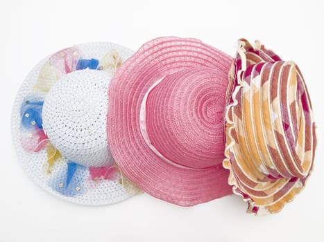 Three multicolored summer panama hats for girls