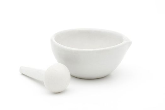 White mortar and pestle over white background