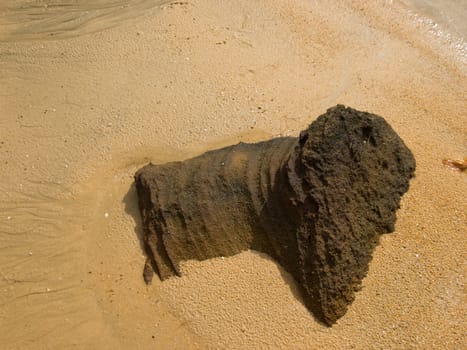 The picture of stone in sands at the desert island