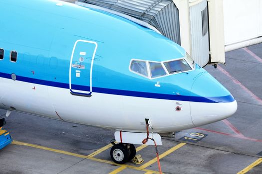 An airplane waiting on the gate