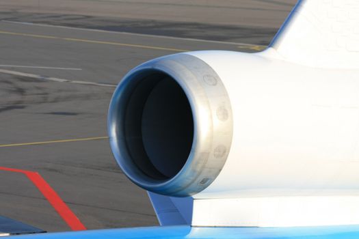 A close up of an airplane wing engine