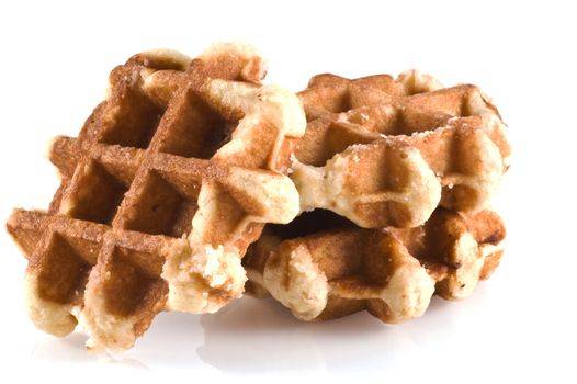 Three waffles isolated on a white background.