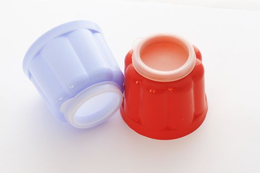 blue and red jelly moulds for single servings of food