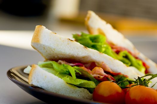 Bacon and lettuce sandwich on the kitchen table