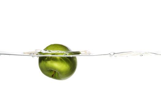 Apple dropped to water on white background