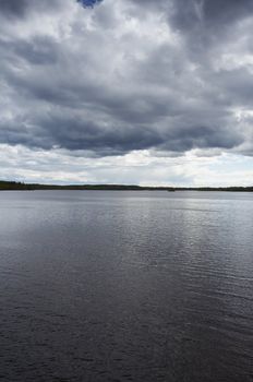 Lake landscape with dramatic clouds