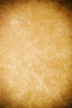 Worn out paper texture background (over saturated)