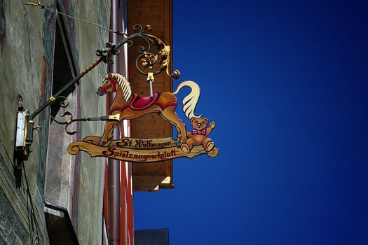An old sign of a toy store in Austria