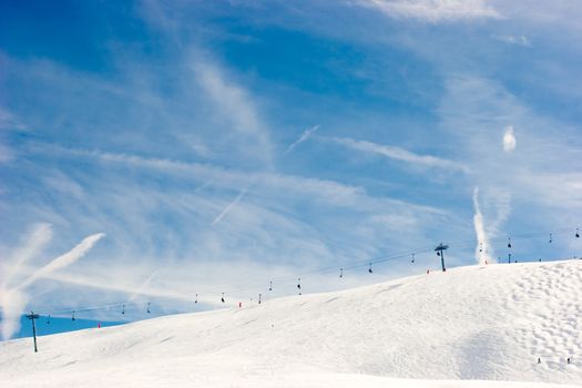 Chairlift at ski resort, French Alps