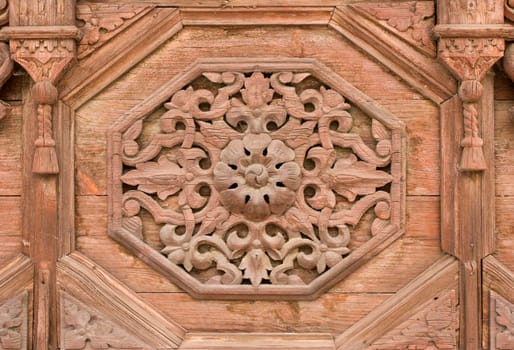 Detail of carved old wall panel.