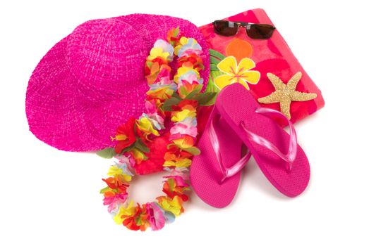 Colorful summer beachwear, flipflops, hat, orchids, sunglasses, and starfish