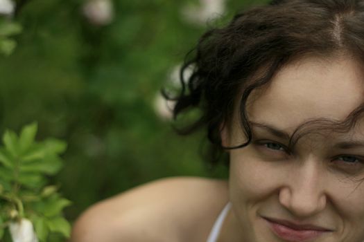 Beautiful girl smiling and enjoying summer. Outdoor shot