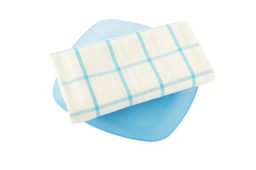 Isolated white towel with blue grid on the blue plastic plate.