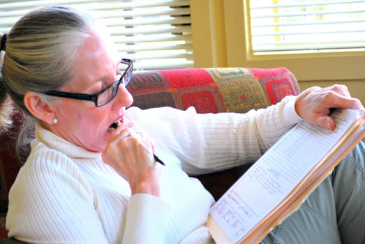 Norwegian female psychiatrist working in her office.