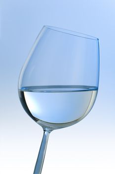 Isolated water glass over white to blue graduated background