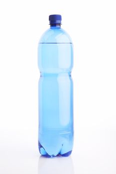 Isolated water bottle on white reflective background with clipping path