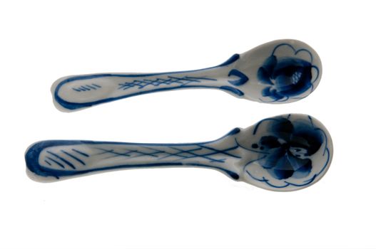 the picture of the russian ceramic spoones (gzhel art)