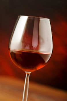 red wine glass over a dark background